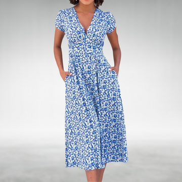Flowing A-Line Midi Dress with Defined Waist and Delicate Floral Pattern