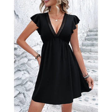 Eva - black dress with ruffles