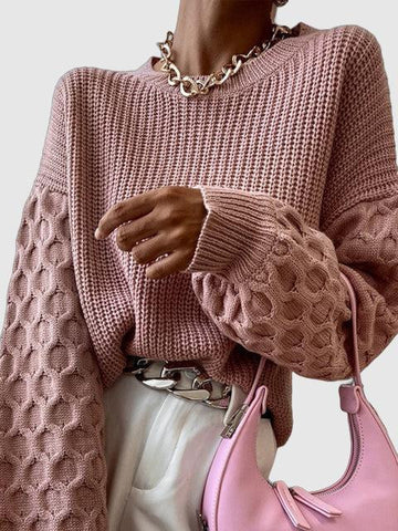 Women's pink bubble knit sweater for chic comfort