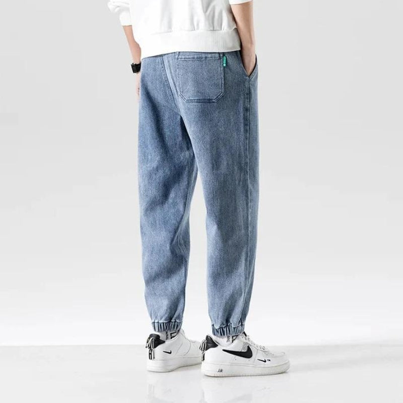 Men's mid-waist light wash denim joggers