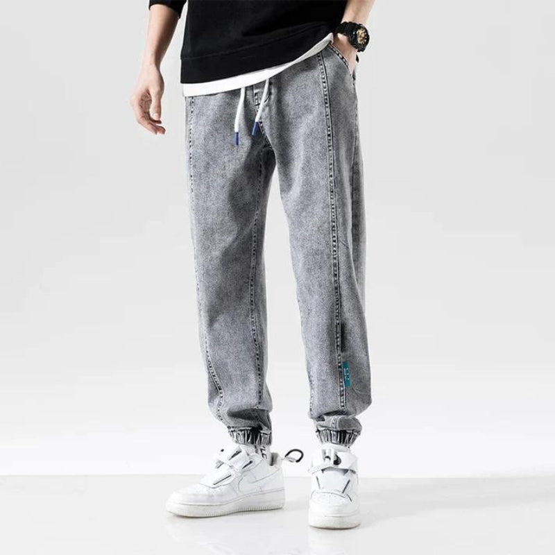 Men's mid-waist light wash denim joggers