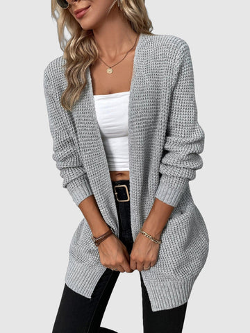 Women's knitted cardigan sweater with v-neck collar and pocket