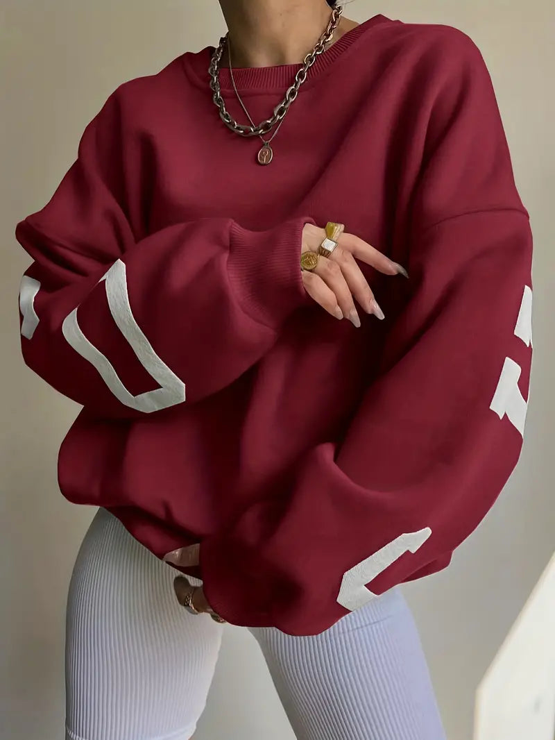 Women's bold oversized graphic sweatshirt for street-smart style