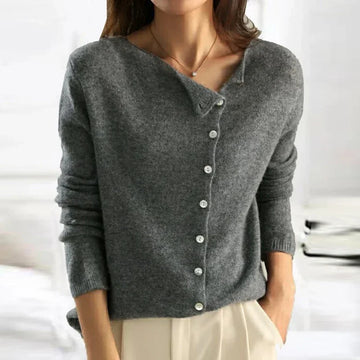 Women's asymmetric button closure sweater