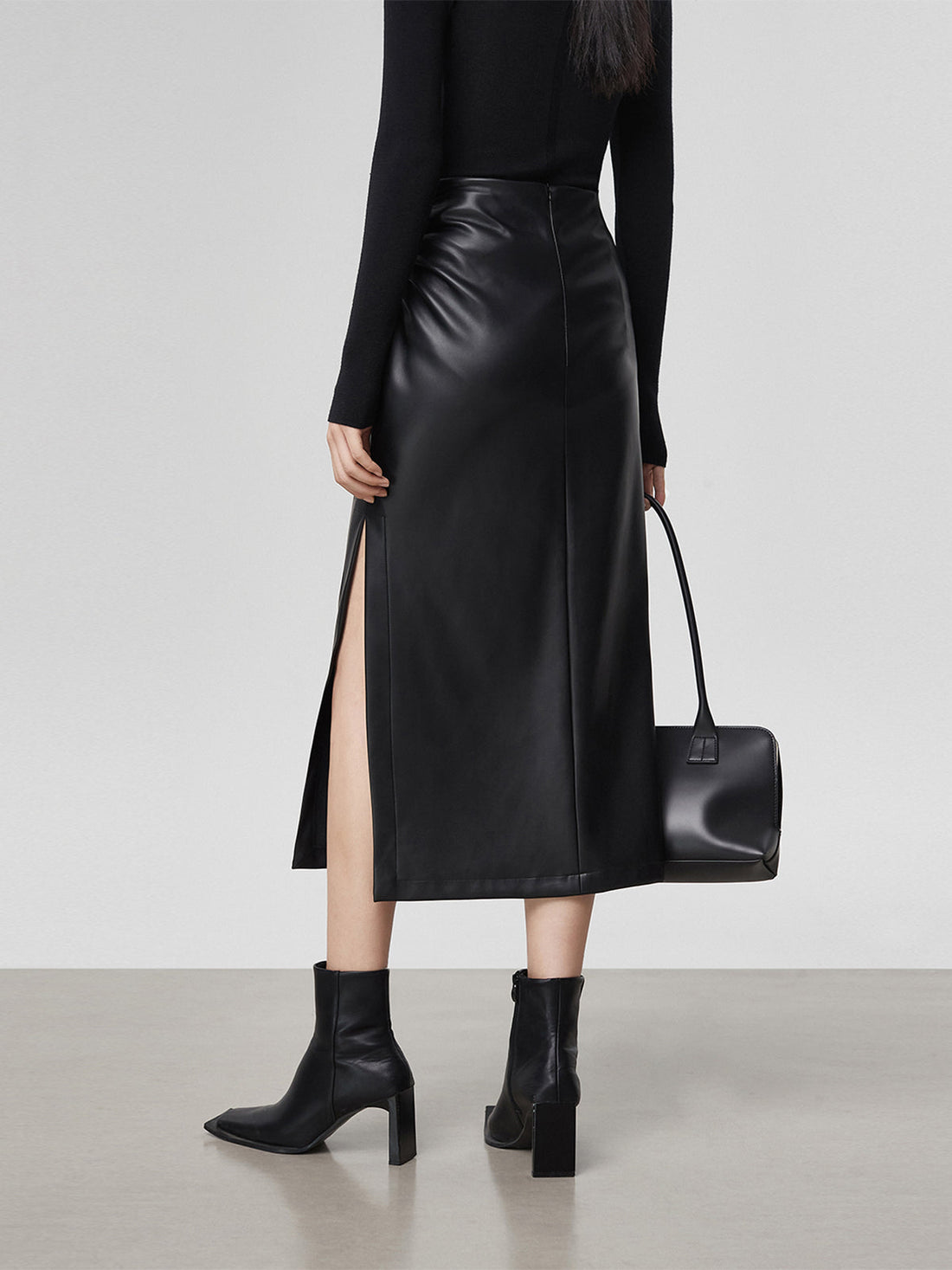 Gail - faux leather ruched slit midi skirt