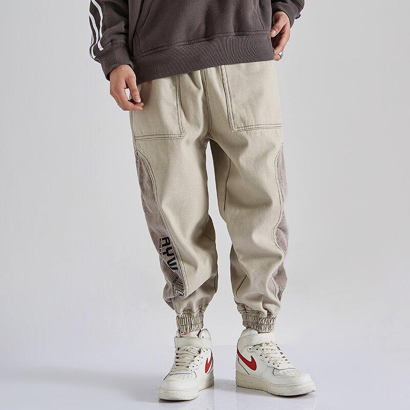 Men's casual pants with contrast corduroy panels