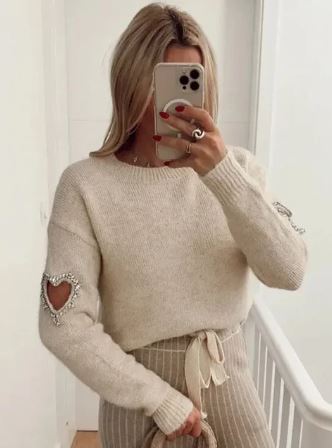 Women's heart-cutout sweater for playful charm