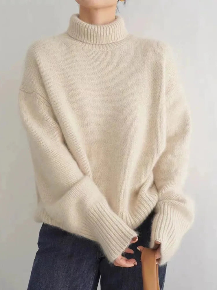 Women's turtleneck sweater with oversized sleeves