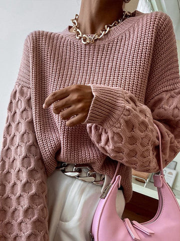 Women's pink bubble knit sweater for chic comfort