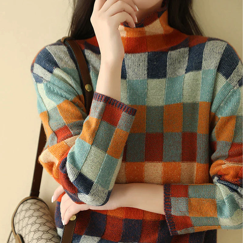 Women's oversized plaid sweater with patchwork design