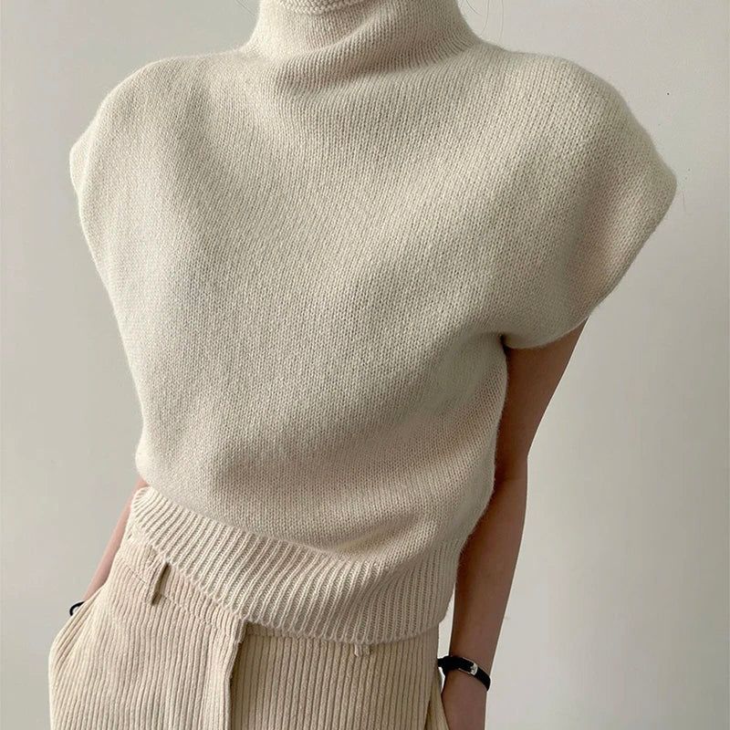 Women's sleeveless turtleneck sweater with ribbed detail