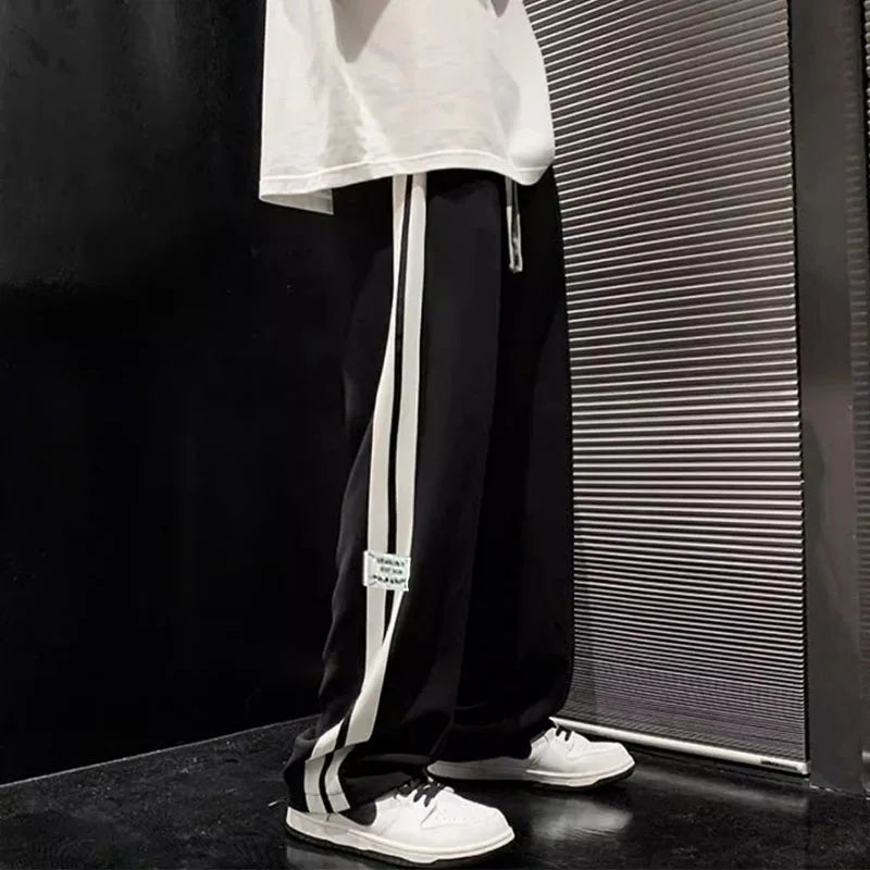 Men's black pants with white stripes