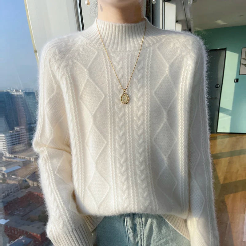 Women's cable knit turtleneck sweater with diamond pattern