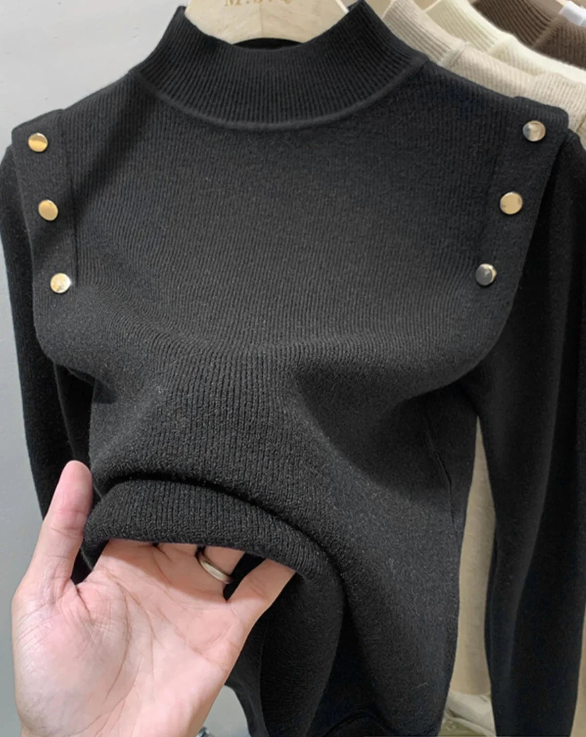 Women's knitted turtleneck sweater with buttons