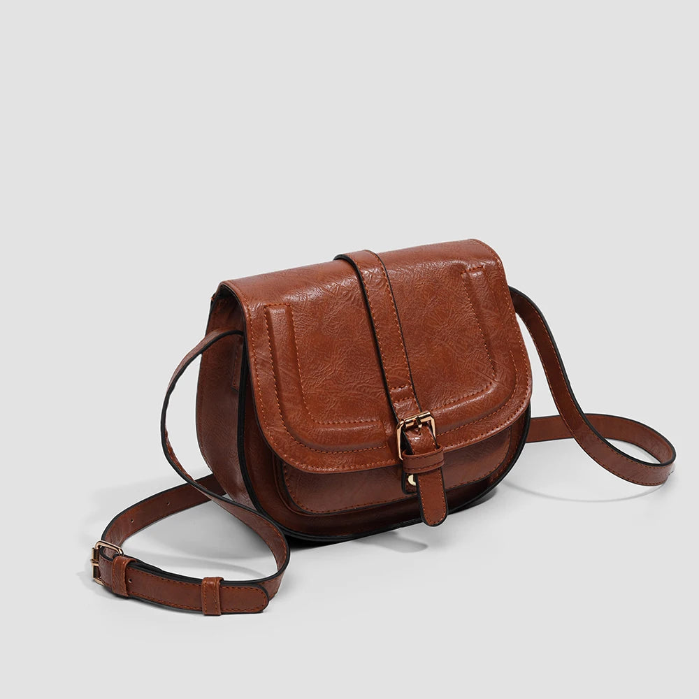 Isla Faux Leather Structured Saddle Bag | Flap Closure Buckle Saddle Bag