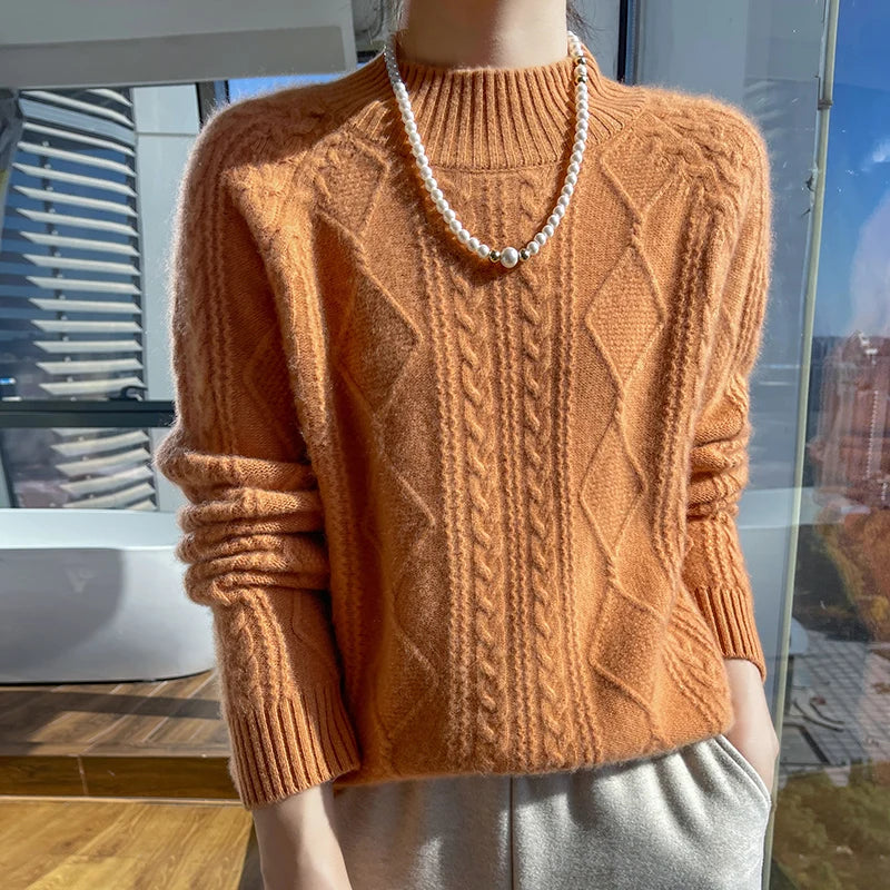 Women's cable knit turtleneck sweater with diamond pattern