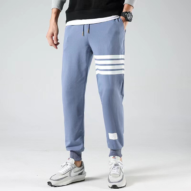 Men's casual joggers with sporty sleeve stripes