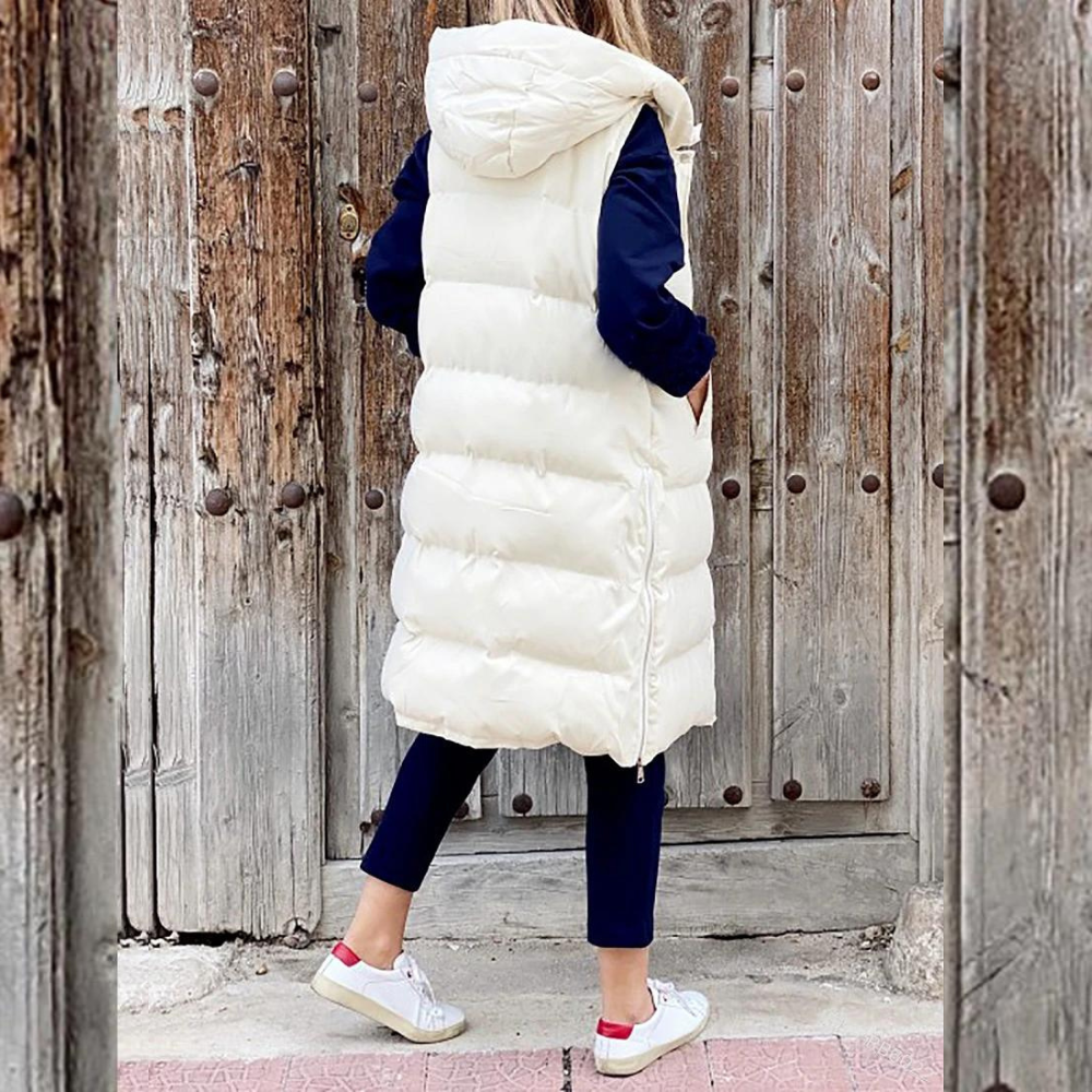 Women's long padded puffer vest for effortless warmth