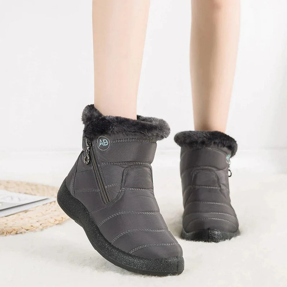 Women's waterproof warm snow boots with flat heel and side zipper