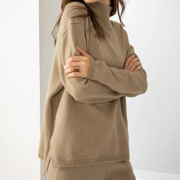 Women's long sleeve turtleneck sweater with asymmetry