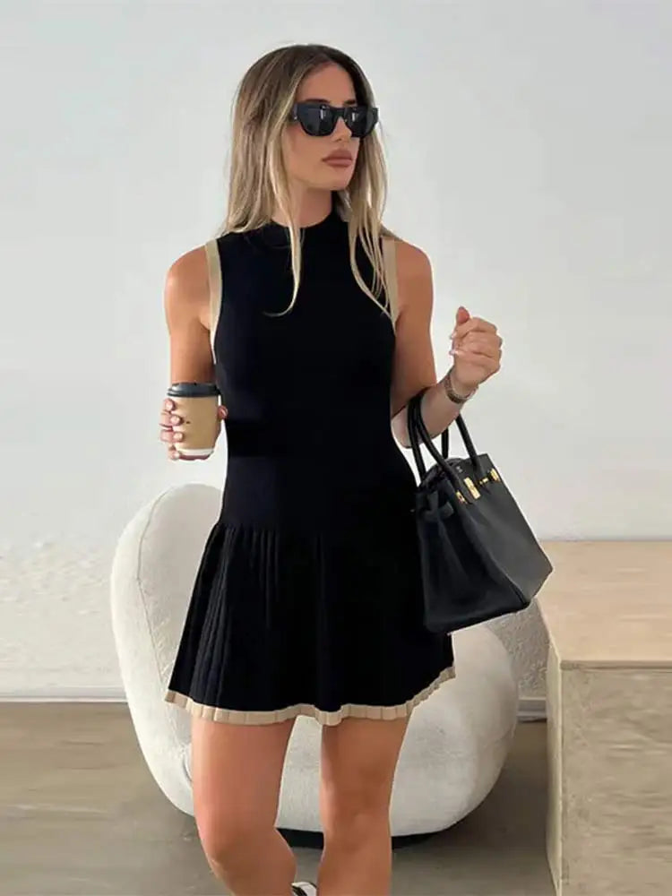 Women's Sleeveless Pleated Mini Dress – High Neck – Fitted Bodice – Elegant Casual Wear