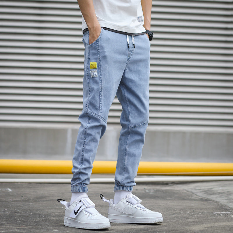 Men's tapered denim joggers with elastic waist