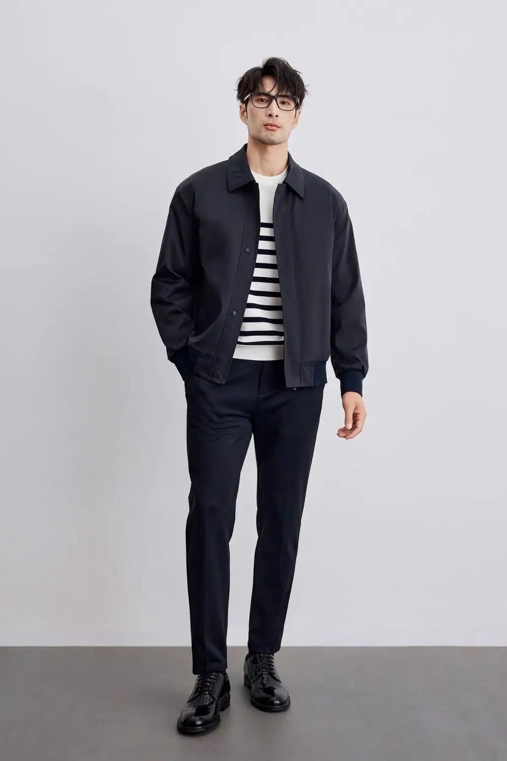 Men's minimalist black jacket for a sleek, modern look