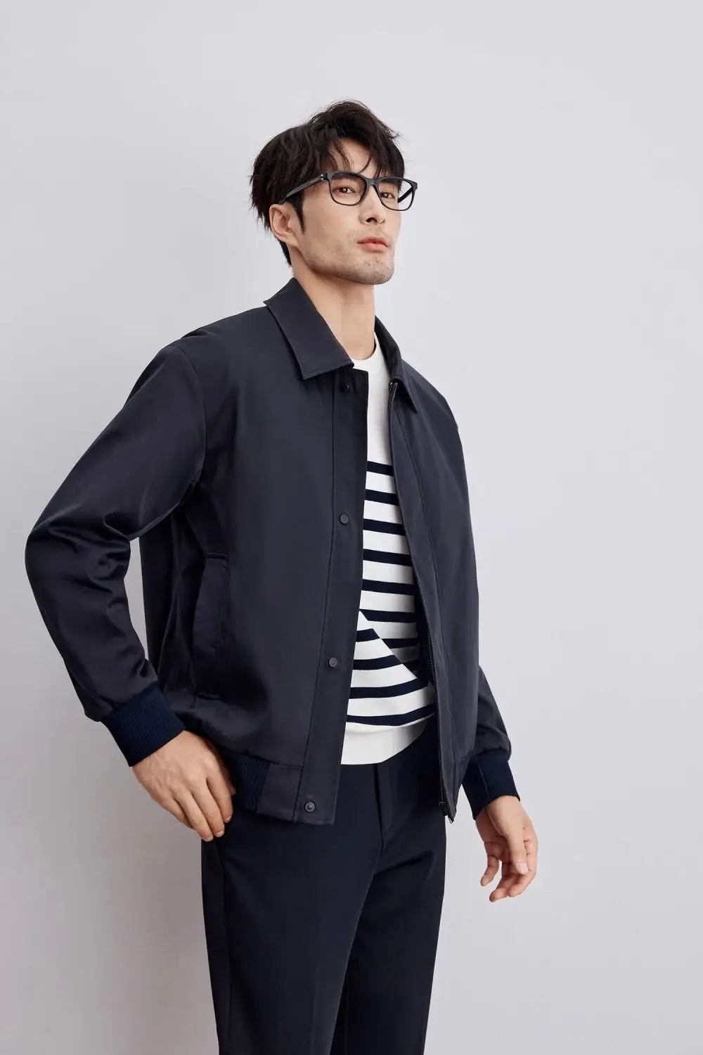 Men's minimalist black jacket for a sleek, modern look