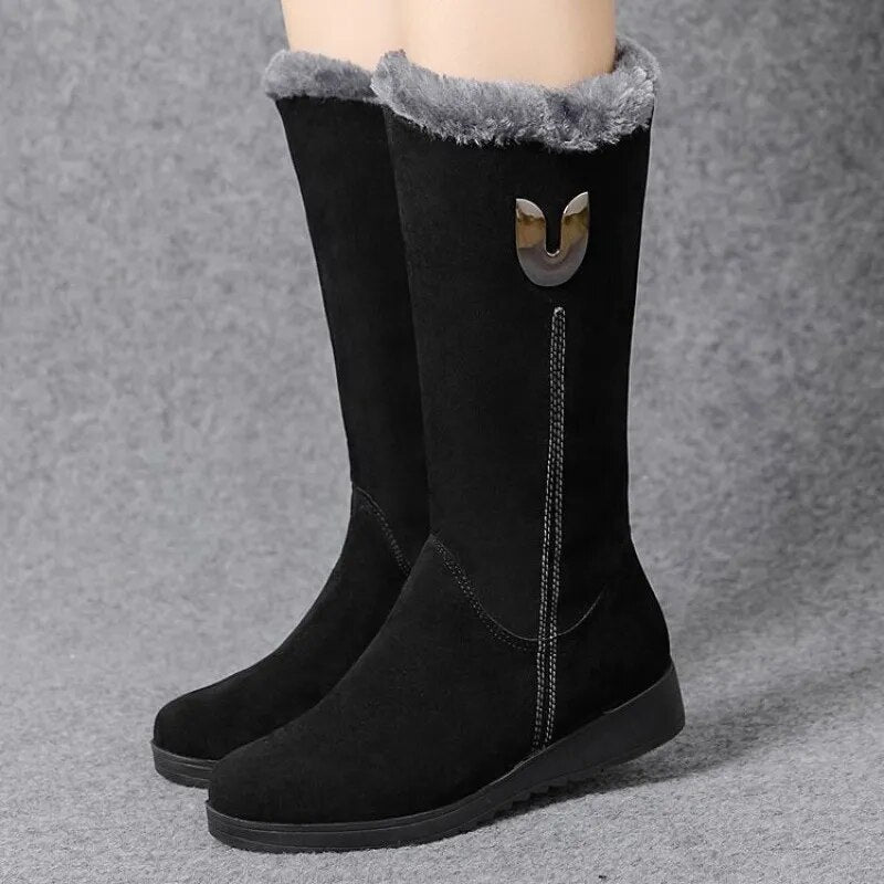 Elegant flat women's boots for casual outings and winter wear