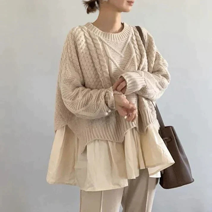 Women's oversized layered knit sweater with flowy hem