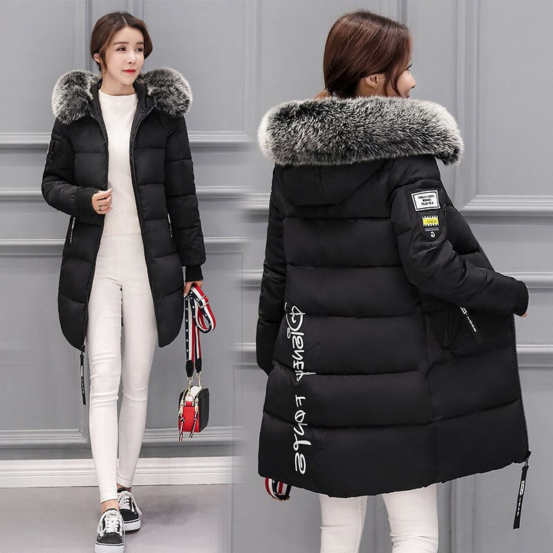 Winter coat for women with hooded collar and zipper placket