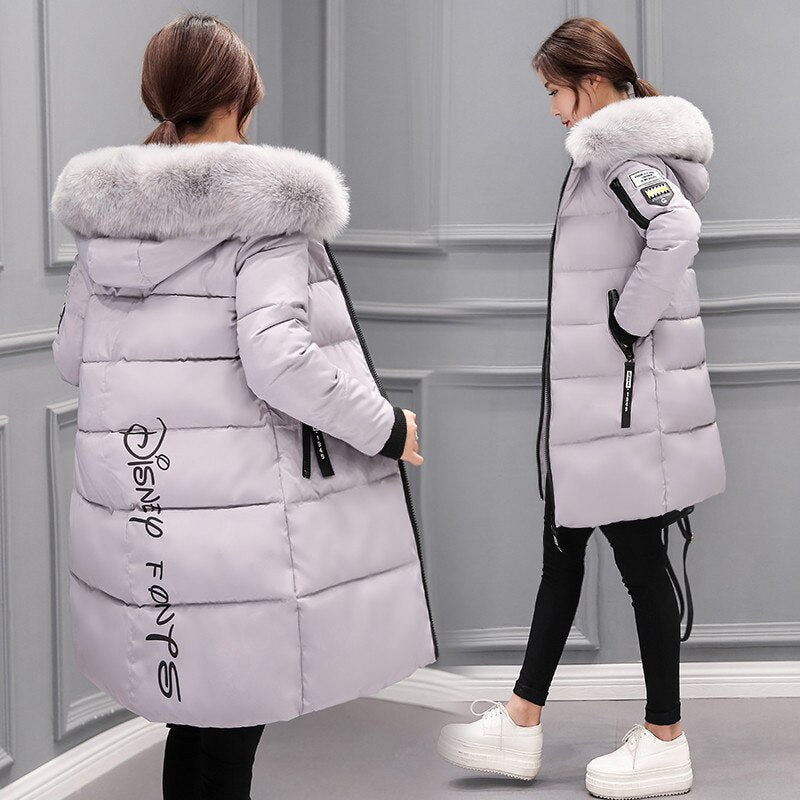 Winter coat for women with hooded collar and zipper placket